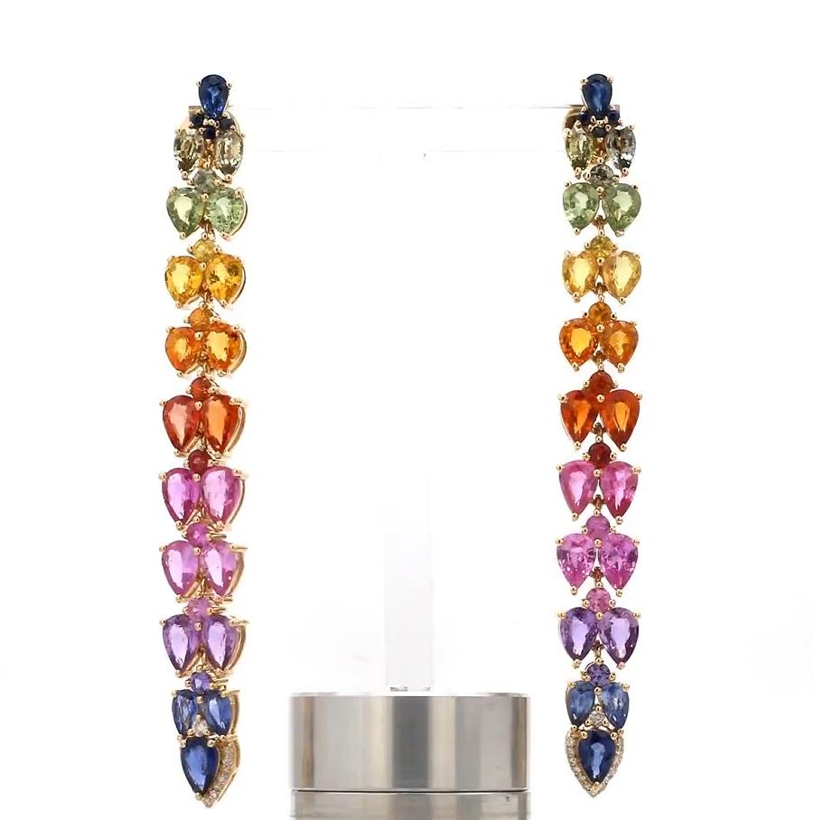 Rainbow pear cut earrings with diamond accents in gold  Long dangle earrings with pear cut rainbow sapphire  Colourful rainbow sapphire 
GEMSTONE DETAILS :
✦ Stone : Rainbow Sapphire
✦ Stone Type : Natural
✦ Stone Size : 5x3MM,5x4MM, 6x4MM
✦ Number