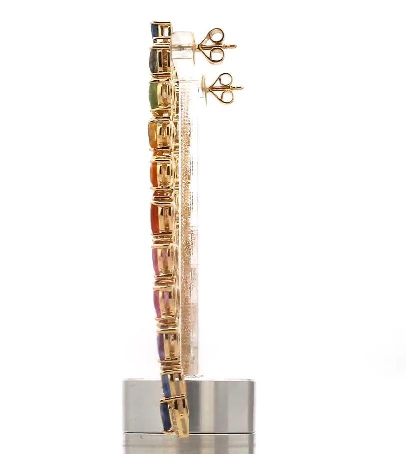 Natural rainbow sapphire earrings in 18k gold en vente 1