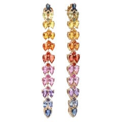 Natural rainbow sapphire earrings in 18k gold