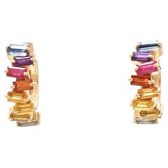 Natural rainbow sapphire earrings in 18k gold