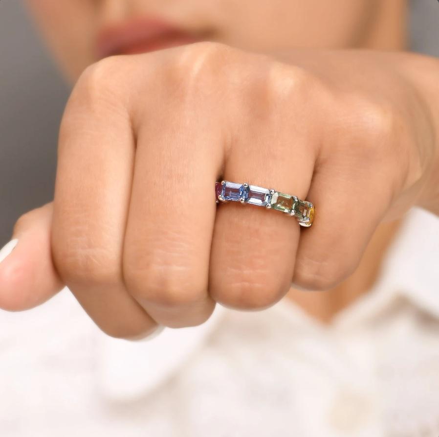 Rainbow sapphire emerald cut east west eternity band ring gold  Natural 4MM wide rainbow sapphire eternity band gold  Rainbow ring gold

GEMSTONE DETAILS :
✦ Gemstone : Rainbow Sapphire
✦ Gemstone Type : Natural
✦ Gemstone Size : 6X4 MM
✦ Gemstone