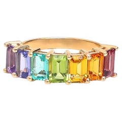Natural rainbow sapphire cut half ring in 14k gold