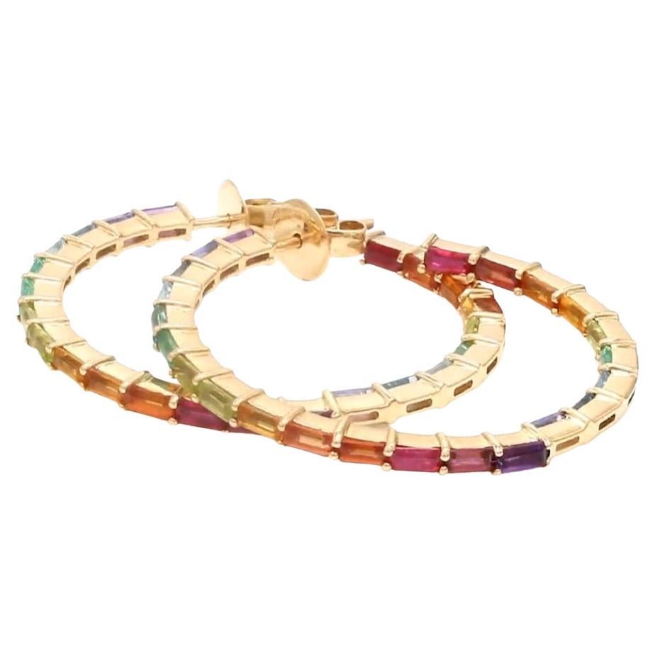 Natural rainbow sapphire earring in 14k gold