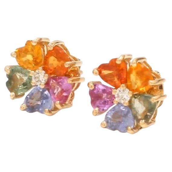 Natural rainbow sapphire earrings in 14k gold