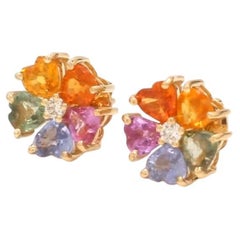 Natural rainbow sapphire earrings in 14k gold