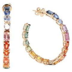 Natural rainbow sapphire earrings in 14k gold
