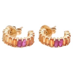 Natural rainbow sapphire earrings in 18k gold