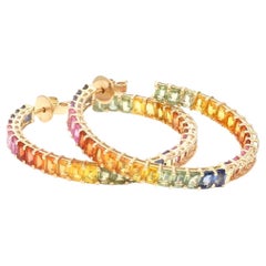 Natural rainbow sapphire earrings in 18k gold