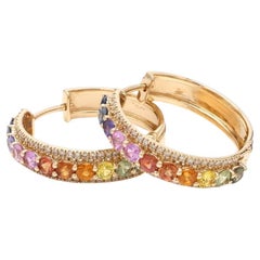Natural rainbow sapphire in 14k gold