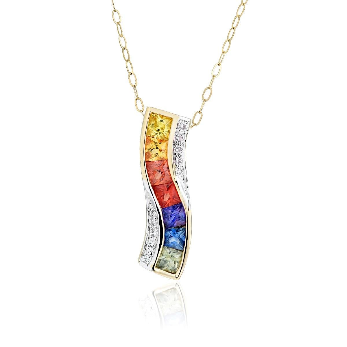 Discover the vibrant charm of this natural rainbow sapphire pendant, featuring a total of 0.80 carats of multi-color sapphires set in 14K yellow gold. Accented by 0.07 carats of sparkling diamonds, this pendant combines playful color with classic