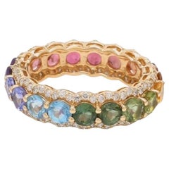 Natural rainbow sapphire diamond ring in 18k gold