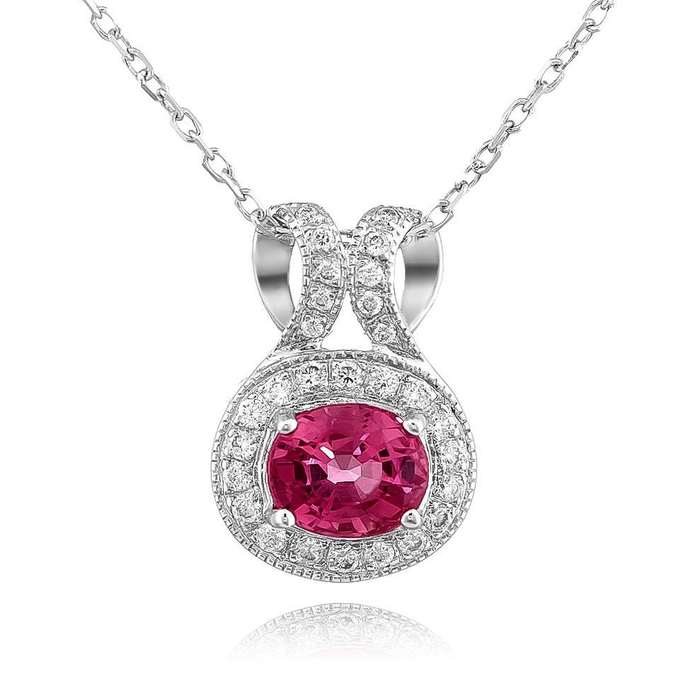 Discover the captivating charm of this 14K white gold pendant, featuring a stunning 0.50-carat natural raspberry rubellite, elegantly accented by brilliant diamonds. The rich pink hue of the rubellite, complemented by sparkling diamonds, creates a