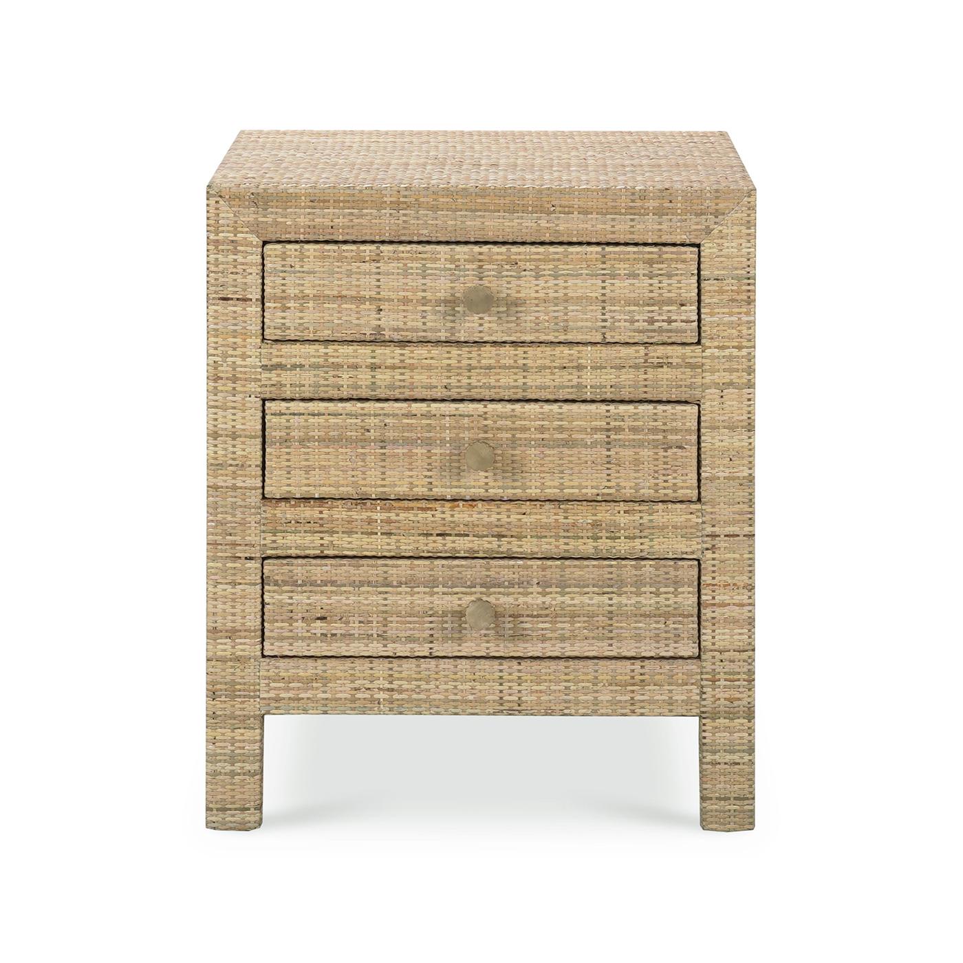 Wrapped in natural rattan, this stunning table combines modern design with coastal charm. It features three drawers for all your storage and bedside essentials.

The natural rattan finish adds a touch of elegance and warmth to any room while helping