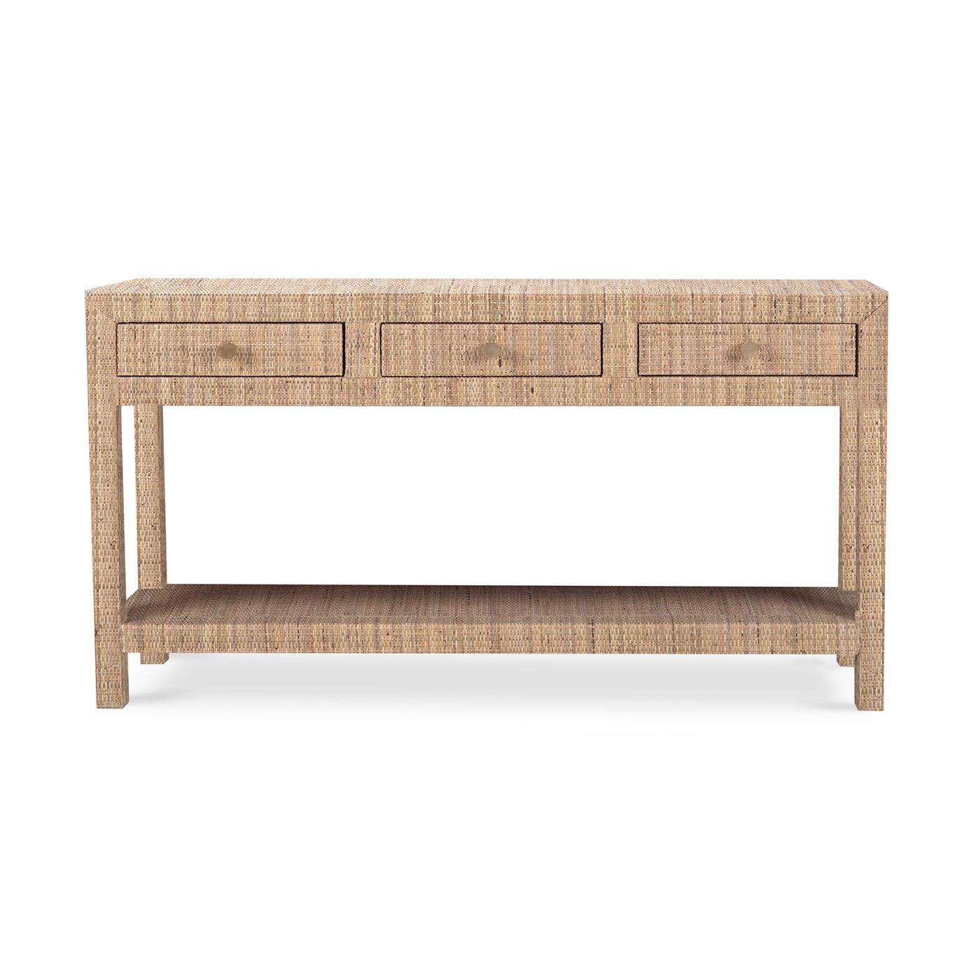 Wrapped in natural rattan, this stunning table combines modern design with coastal charm. It features three spacious drawers for all your storage needs and an open lower shelf perfect for displaying your favorite decor items.

The natural rattan