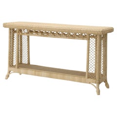 Tavolo consolle in rattan naturale con design organico