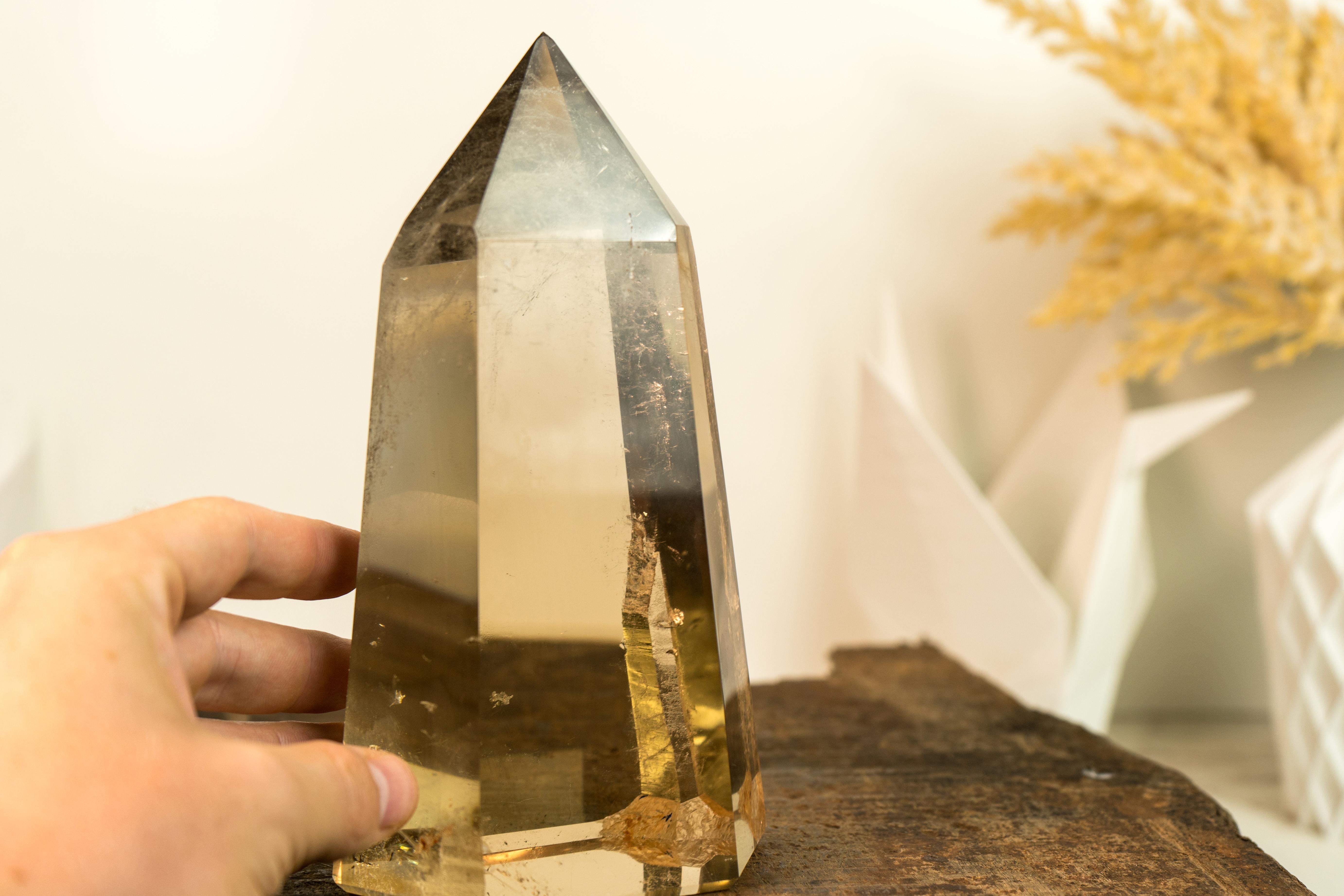 AAA Natural Honey Orange Citrine Obelisk Tower: A Display of Exceptional Water-Clear Citrine Crystal

▫️ Description

Standing tall in its obelisk tower form, this natural citrine is an outstanding sculpture that blends Nature's perfect crystal with
