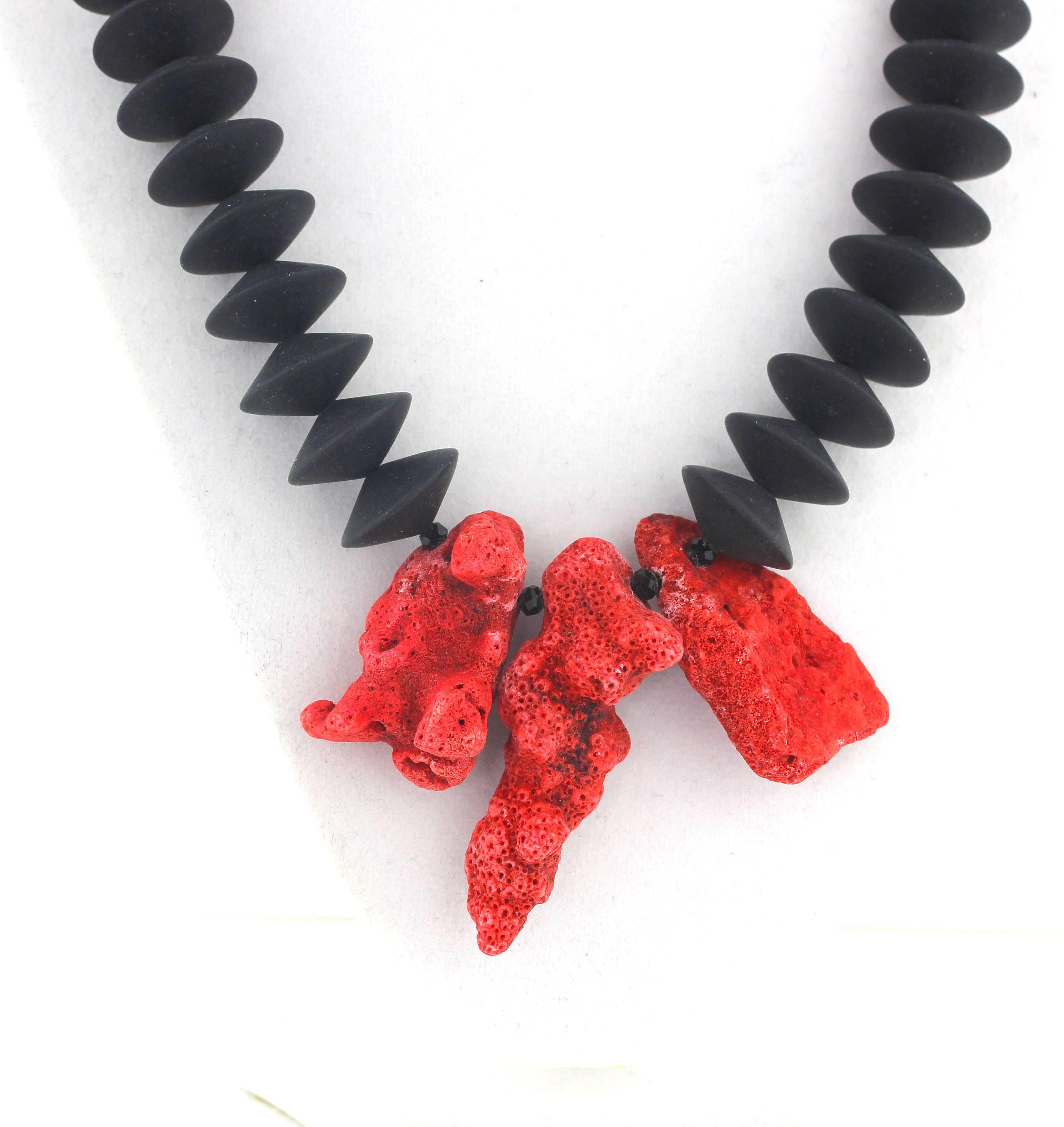 Super Elegant necklace of three large chunks of very rare unique Red Coral and gem cut flat black Onyx with tiny black Spinel accents compose this handmade necklace.  The longest  Red Coral is 57mm and the necklace is a pleasing 20 inches in length.