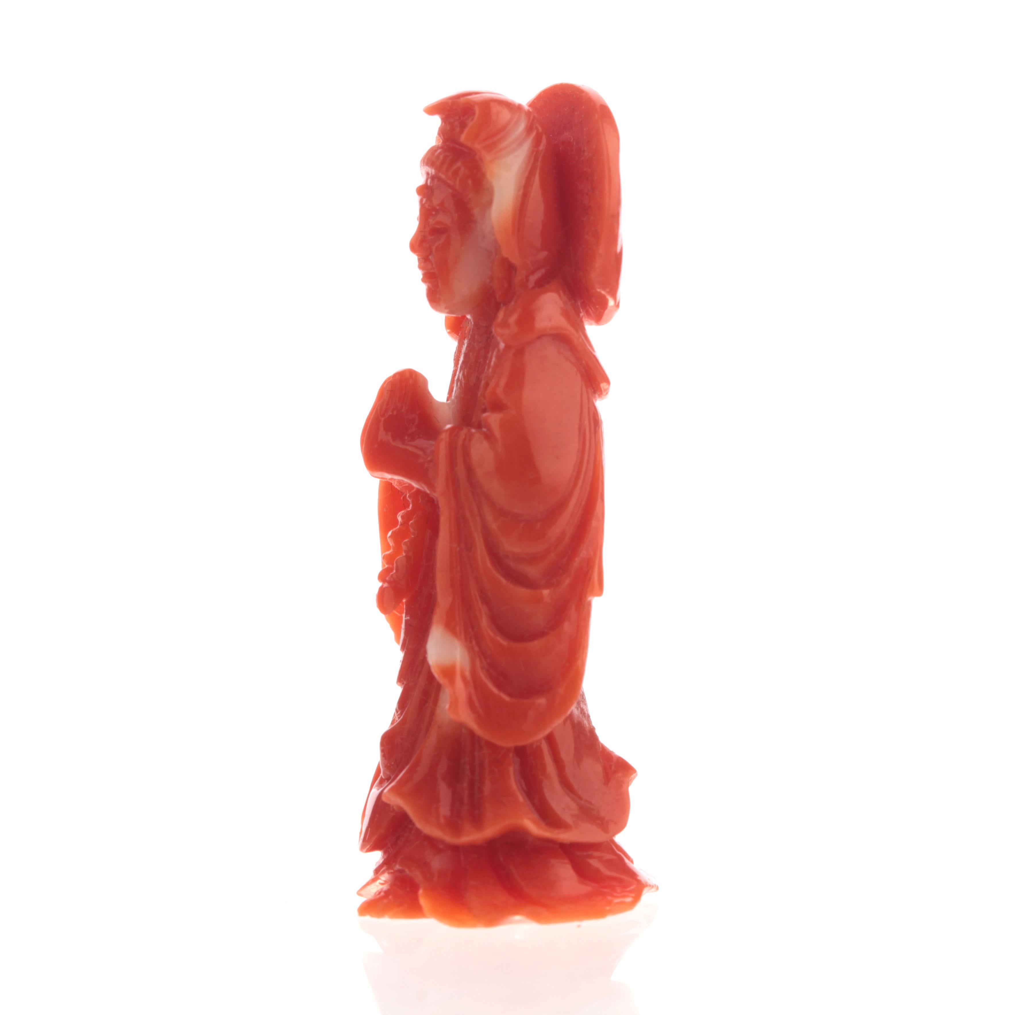 red mary statue