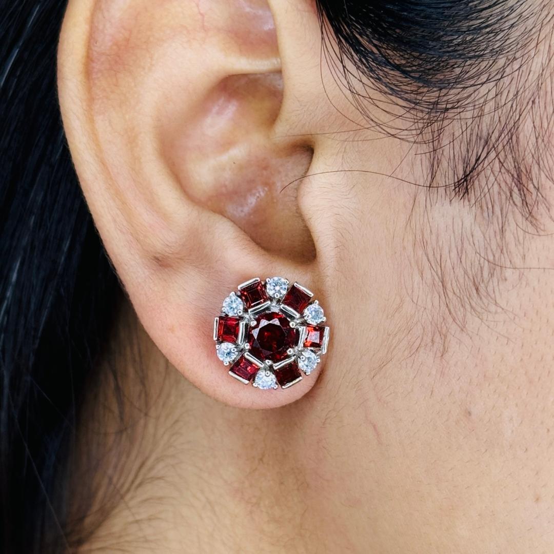 Natural Red Garnet Aura Round Sterling Silver Stud Earrings in sterling silver to make a statement with your look. You shall need stud earrings to make a statement with your look. These earrings create a sparkling, luxurious look featuring, round,