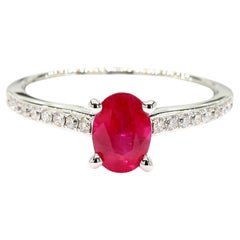 Natural Red Oval Ruby and White Diamond 1.06 Carat TW Gold Cocktail Ring