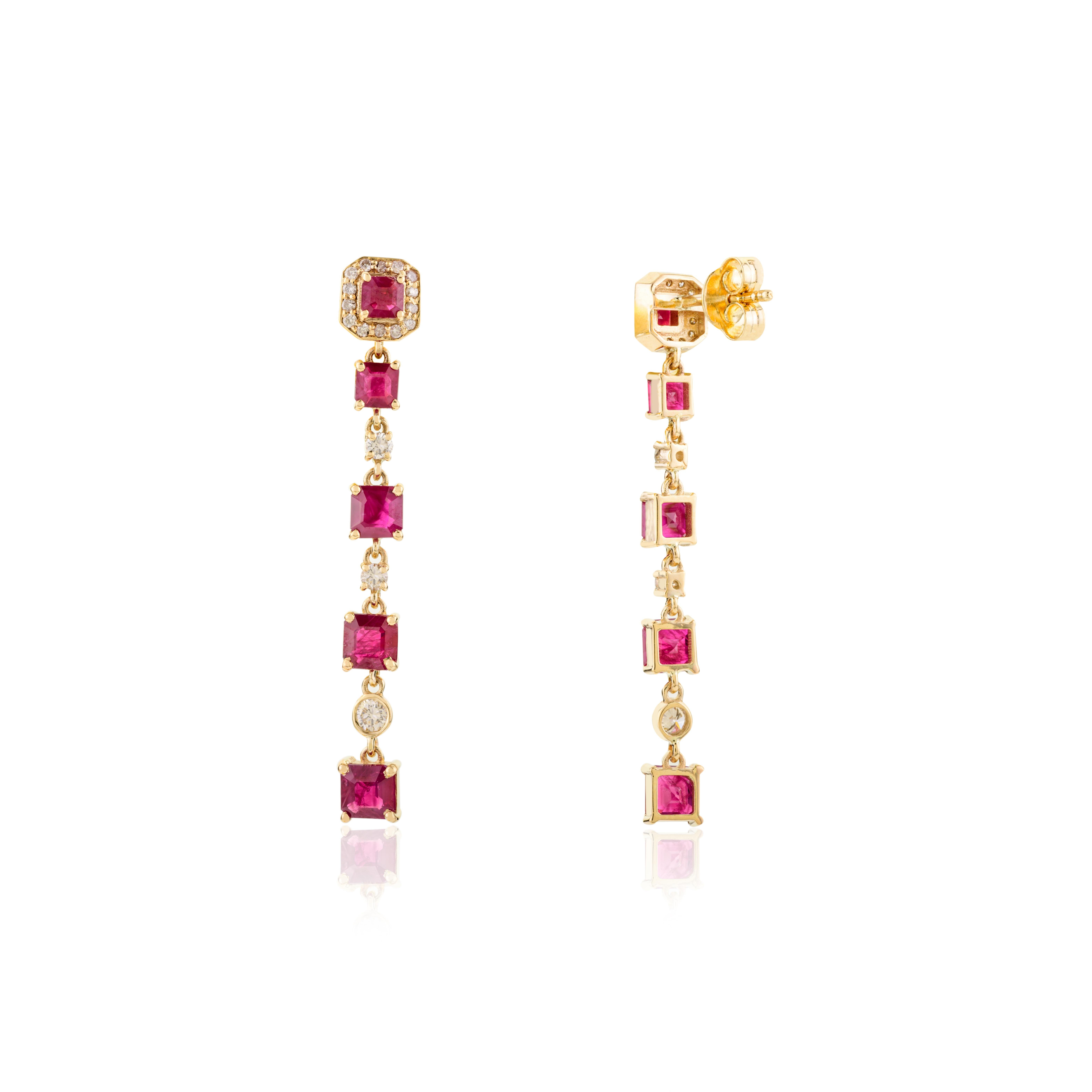 Orecchini con rubino rosso naturale e diamanti per lei in oro giallo 14 carati, per fare un figurone con il tuo look. Per dare un tocco di classe al tuo look, ti servono degli orecchini pendenti. Questi orecchini creano un look scintillante e