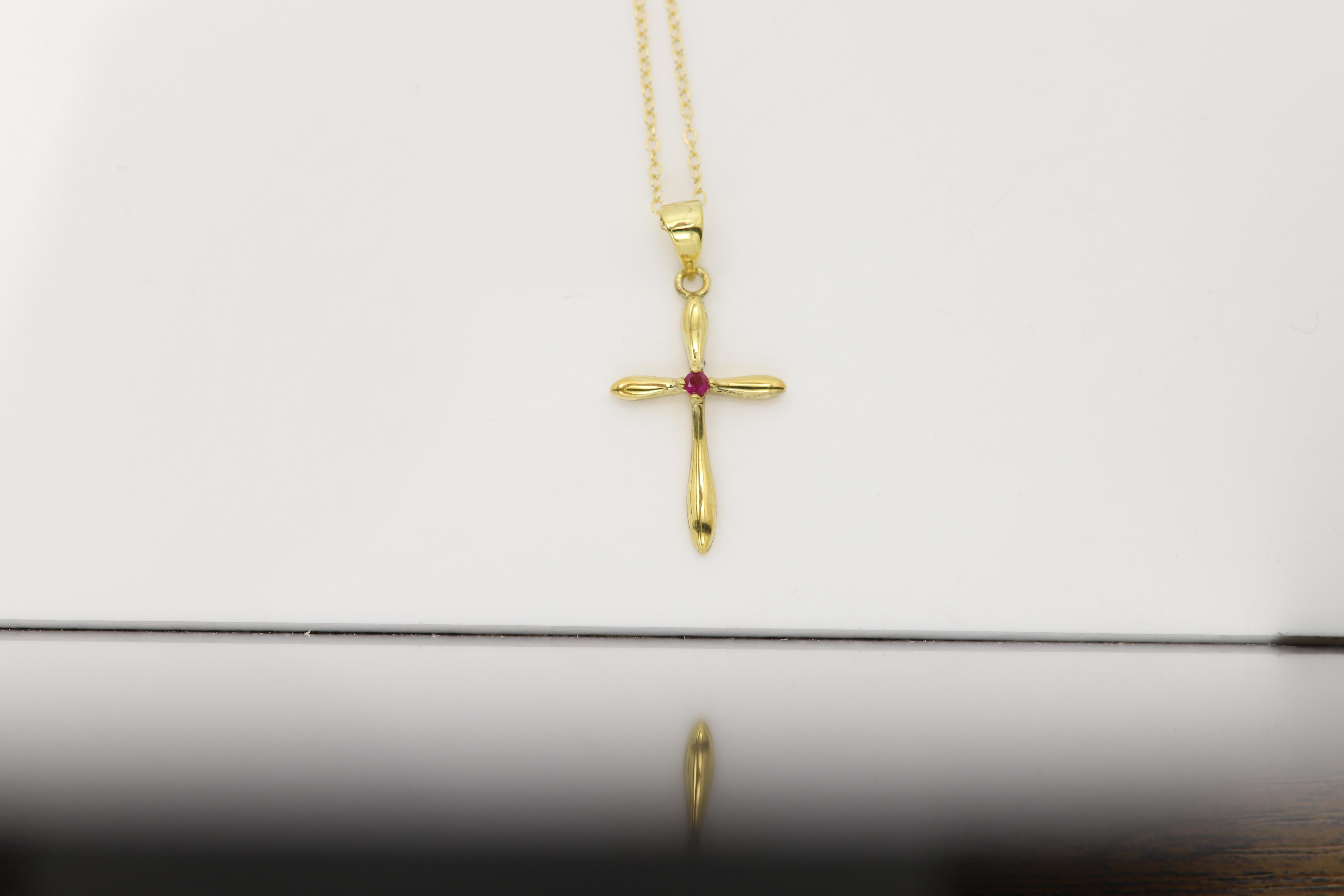New Cute Cross Pendant
Sterling Silver 925 plated with Yellow Gold
approx weight 2.8 grams 
Chain: 18' inch
Size: approx 1' inch tall
Center stone: Natural Ruby 2.0mm approx 0.04ct - 0.05ct
Nice Red Color
+ Gift Box