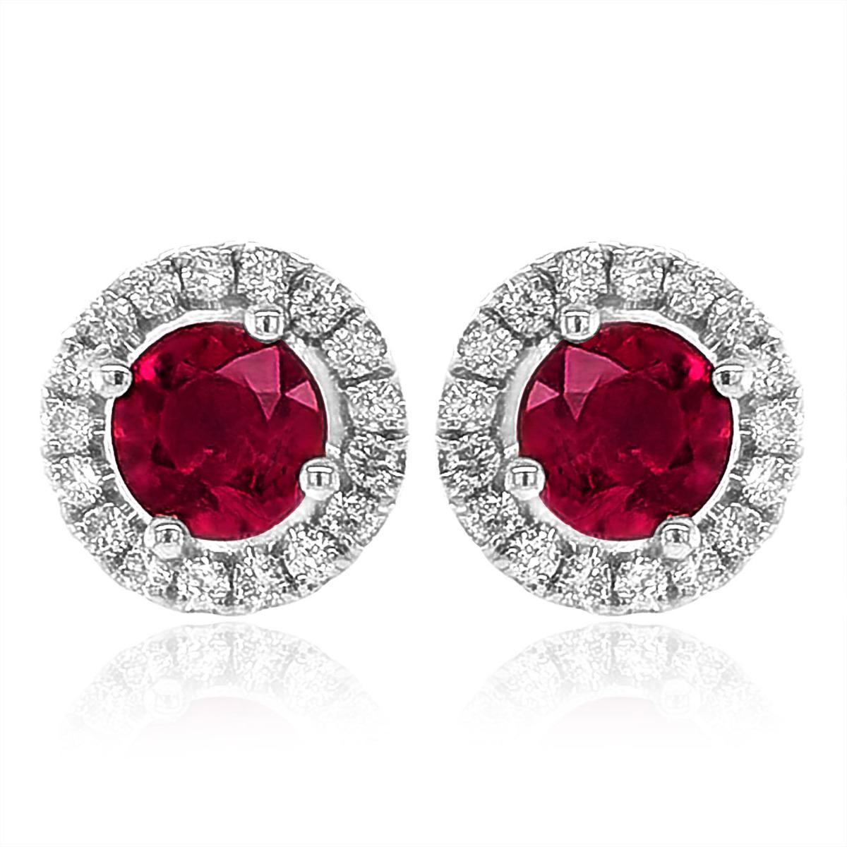 Discover the timeless elegance of natural rubies, exquisitely set in 14K white gold earrings. These stunning earrings, complemented by sparkling diamonds, showcase the finest craftsmanship and the captivating beauty of these precious gemstones.