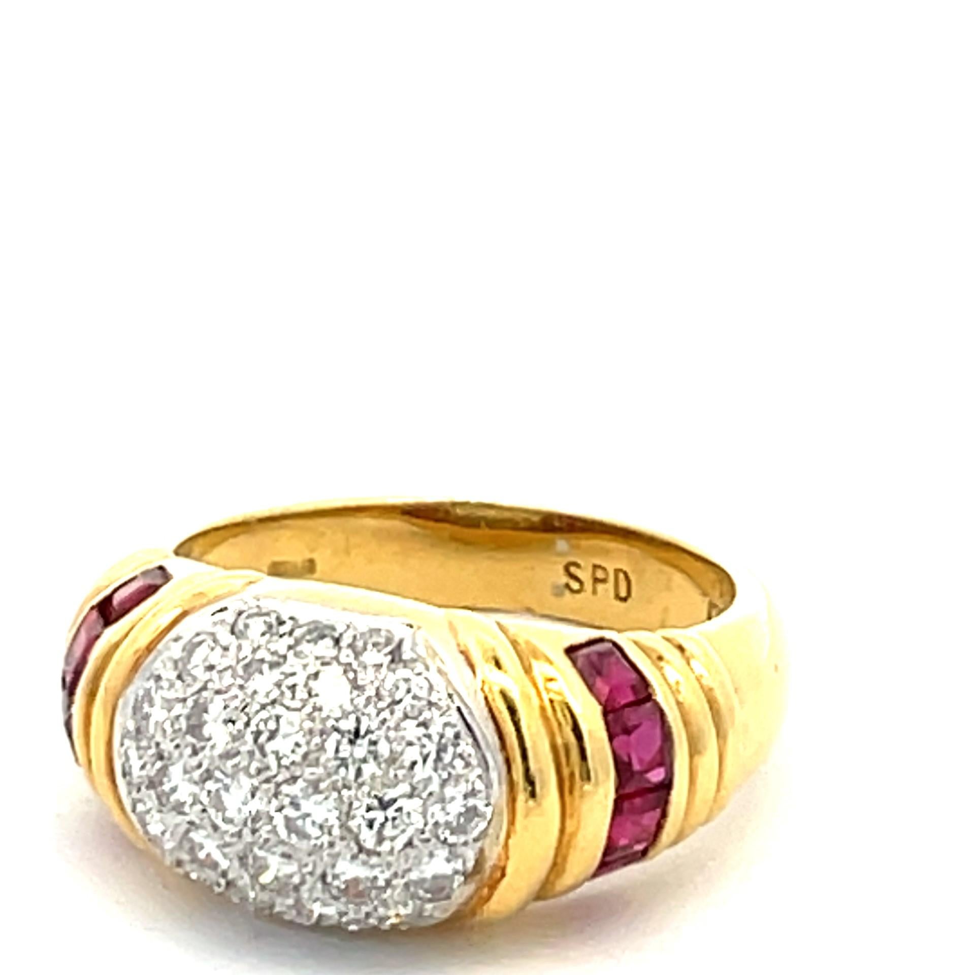 Gorgeous pave dome ring with natural princess cut red ruby and white diamond in 18 karat yellow gold.

8 princess cut ruby 0.90ct total weight

30 brilliant cut natural diamonds 0.75ct total weight

18kt white gold weighing 8 grams

Stamped SPD &