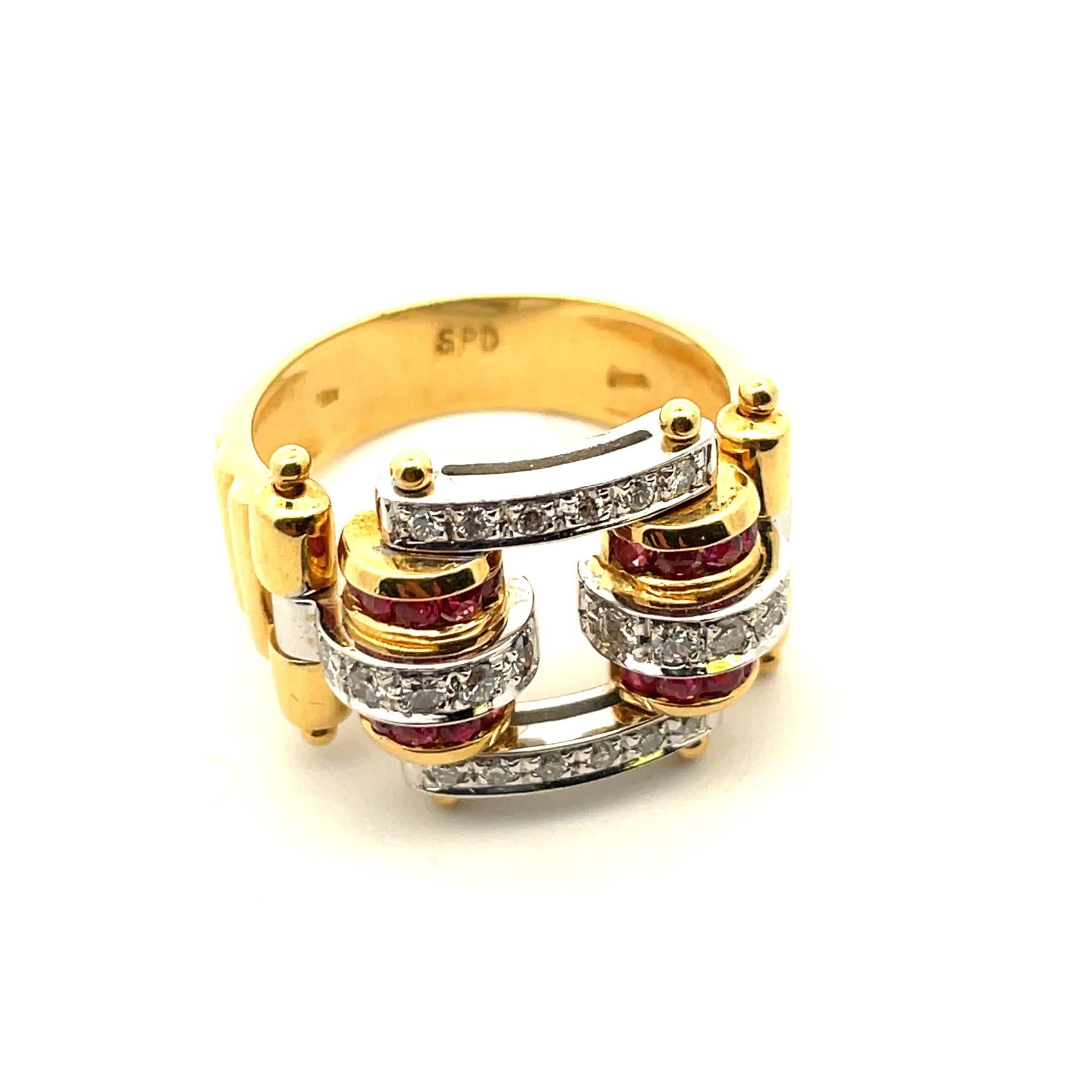 One natural red ruby and natural brilliant cut white diamond double scroll ring in 18 kt yellow gold. If you're looking for something with a cool and uncommon design look no further.

20 natural red ruby 0.60ct total weight

22 brilliant cut natural