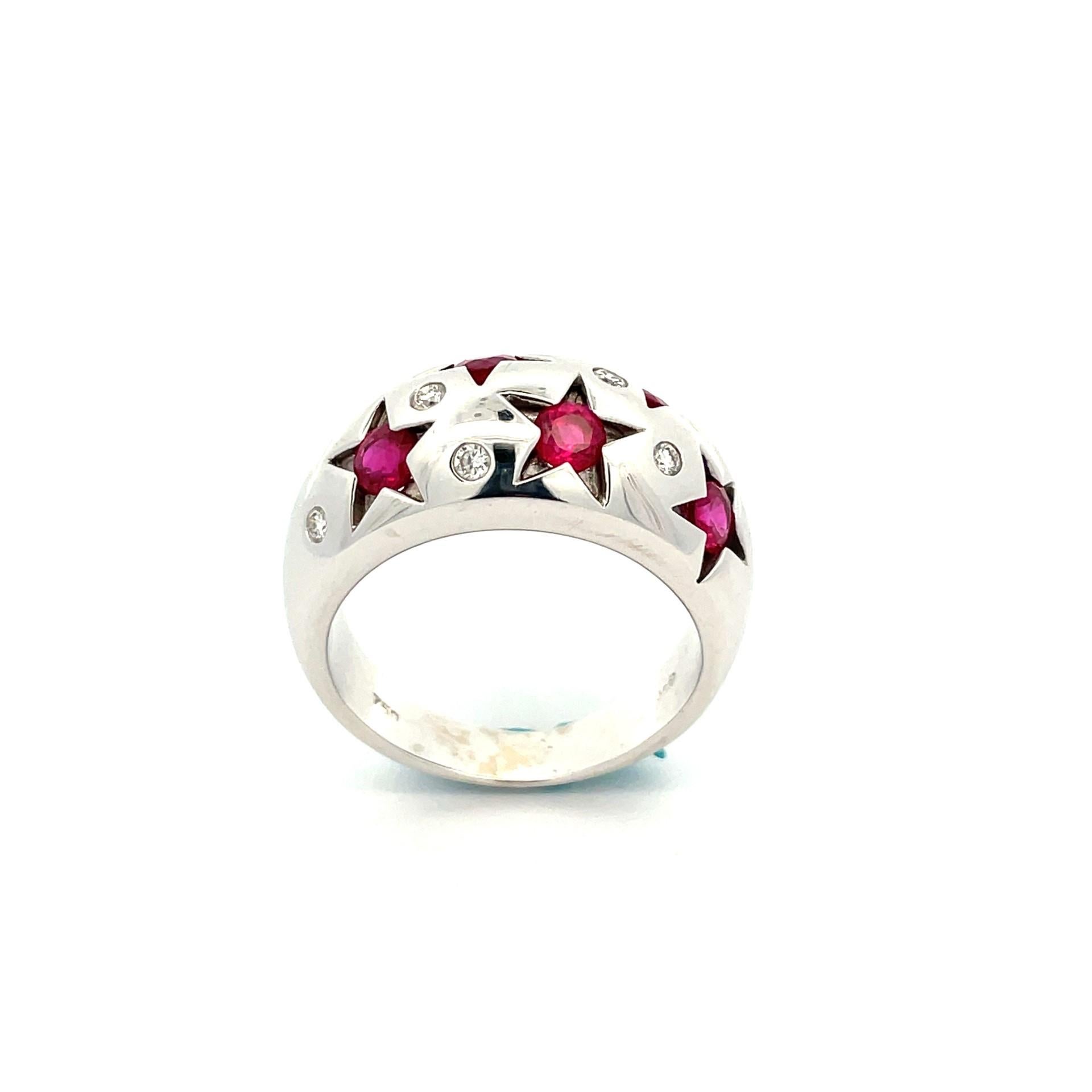 One 18kt white gold polished star ring with natural red ruby and natural white diamonds. Feel like a star !

6 round cut natural ruby weighing 1.42ct total weight

8 brilliant cut diamonds weighing 0.19ct total weight, quality G/VS

18kt white gold,