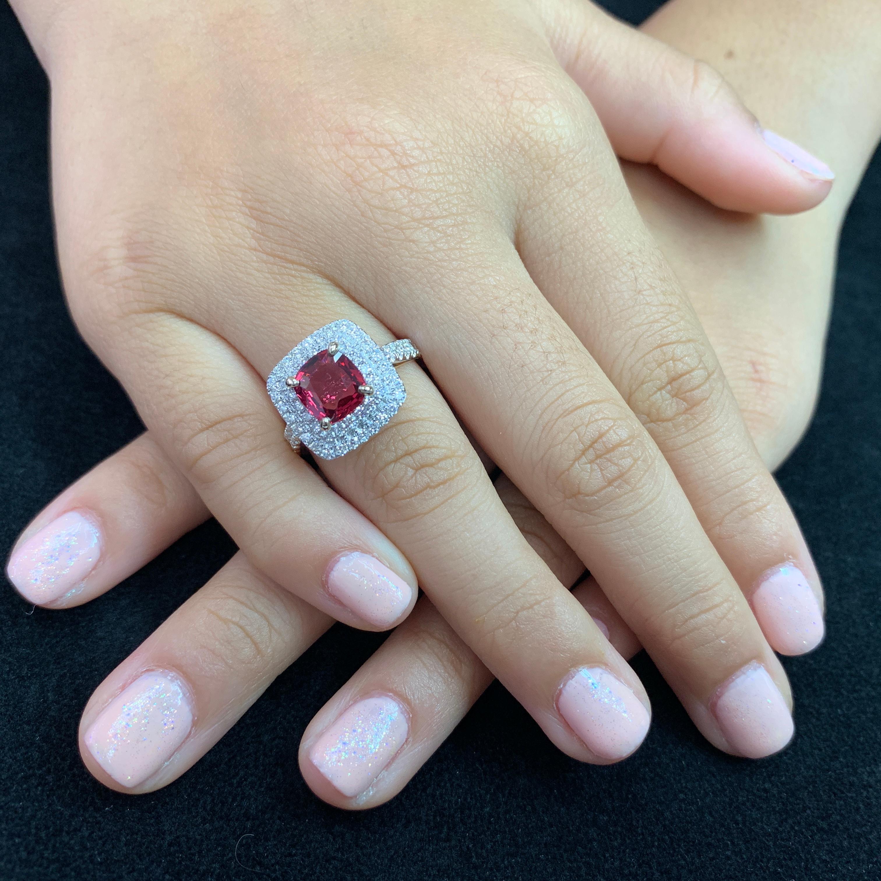 Here is a natural red Spinel and diamond ring. . The ring is set in 18k white gold and rose gold with diamonds. The center red spinel is 1.51 Cts. There are 0.72 carats of diamonds in this two tone setting. . The Spinel is clean and It is full of