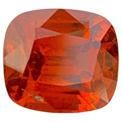 Natural Reddish Orange Garnet Gemstone: 3.75 Carat Cushion Cut