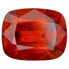 Natural Reddish Orange Grossular Garnet Gemstone: 10.80 Carat Cushion Cut
