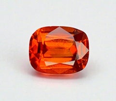 Natural Reddish Orange Grossular Garnet Gemstone: 2.20 Carat Cushion Cut