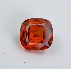 Natural Reddish Orange Grossular Garnet Gemstone: 2.60 Carat Cushion Cut