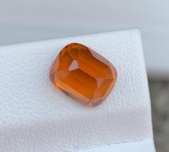Natural Reddish Orange Grossular Garnet Gemstone: 3.40 Carat Cushion Cut
