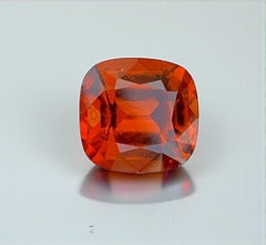 Natural Reddish Orange Grossular Garnet Gemstone: 4.30 Carat Cushion Cut