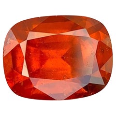 Natural Reddish Orange Grossular Garnet Gemstone: 5.05 Carat Cushion Cut