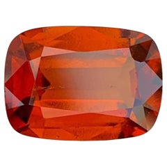Natural Reddish Orange Grossular Garnet Gemstone: 6.26 Carat Cushion Cut