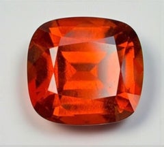 Natural Reddish Orange Grossular Garnet Gemstone: 7.87 Carat Cushion Cut