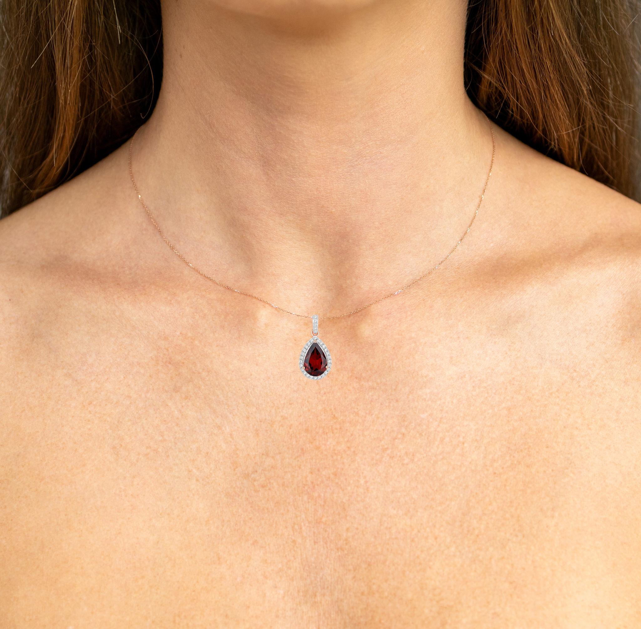 It comes with the appraisal by GIA GG/AJP
Rhodolite Garnet = 3 Carat ( 12 x 8 mm )
Cut: Pear
Total Quantity of Garnet: 1
Primary Stone Color: Red
Diamonds = 0.30 Carats
Total Quantity of Diamonds: 31
Metal: 14K Rose Gold
Dimensions: 23 x 11.5 x 6 mm