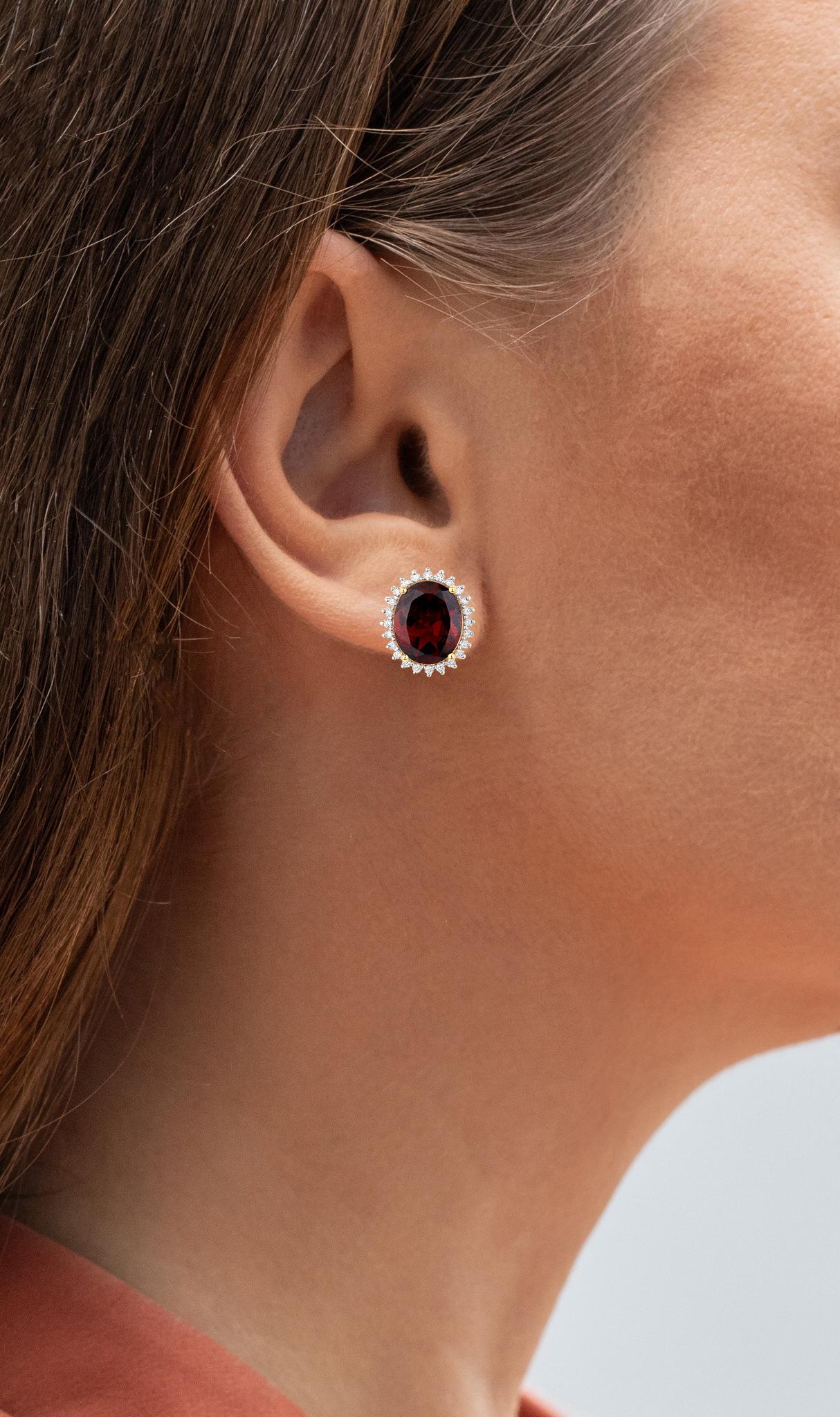 It comes with the Gemological Appraisal by GIA GG/AJP
All Gemstones are Natural
2 Rhodolites = 7.80 Carats
48 Diamonds = 0.48 Carats
Metal: 14K White Gold
Post With Friction Back
Dimensions: 15 x 13 mm