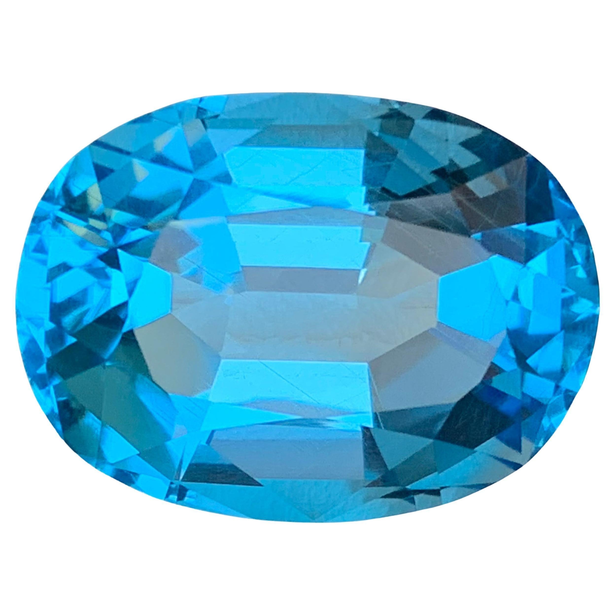 Topazio svizzero blu cielo ricco Nature 44,79 carati taglio ovale Gemma sfusa per ciondolo