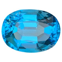 Topazio svizzero blu cielo ricco Nature 44,79 carati taglio ovale Gemma sfusa per ciondolo