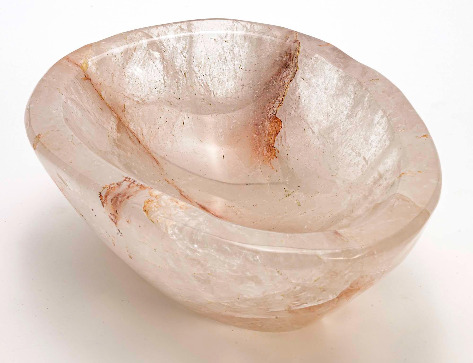 Organic shape, natural polished rock crystal quartz bowl. Tinged rose colored veins giving a beautiful warm glow. Large heavy bowl. 11.5 wide. Very decorative and useful display.
