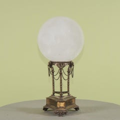 Natural Rock Crystal Sphere on a Neoclassical Polished and Patinated Bronze Base
