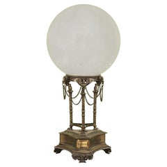 Natural Rock Crystal Sphere on a Neoclassical Polished and Patinated Bronze Base