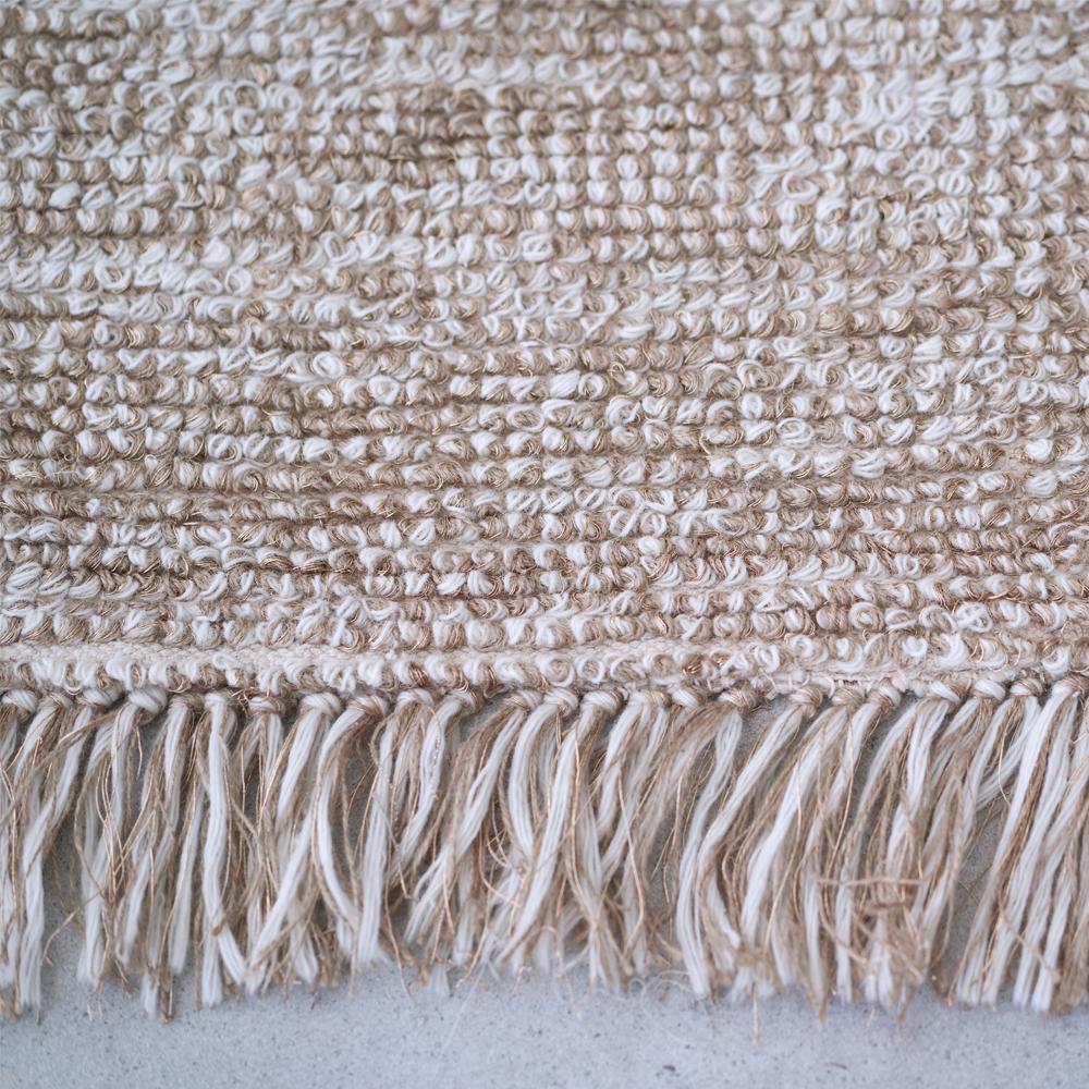The Mars weave is inspired by natural rock patterns, it pairs raw jute with luxe wool and gold accents to create a textured weave, with an earthly but otherworldly texture. This weave blends the labels love of mixing natural and organic materials