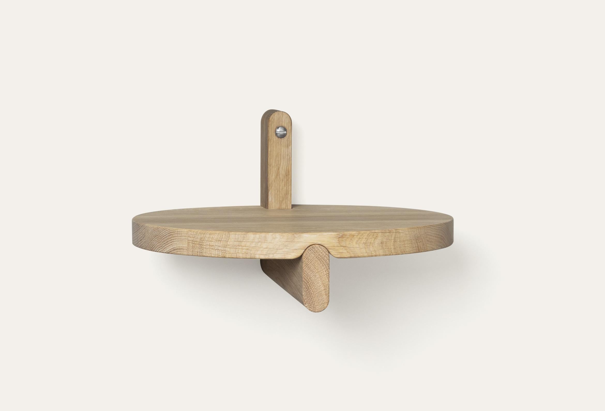 Natural Rondelle round shelf by Storängen Design
Dimensions: D 25 x H 14 cm
Materials: oak wood.
Available in other colors and with or without steel hanger.

Rondelle can be a shelf or a small table depending on your needs. It shares the same