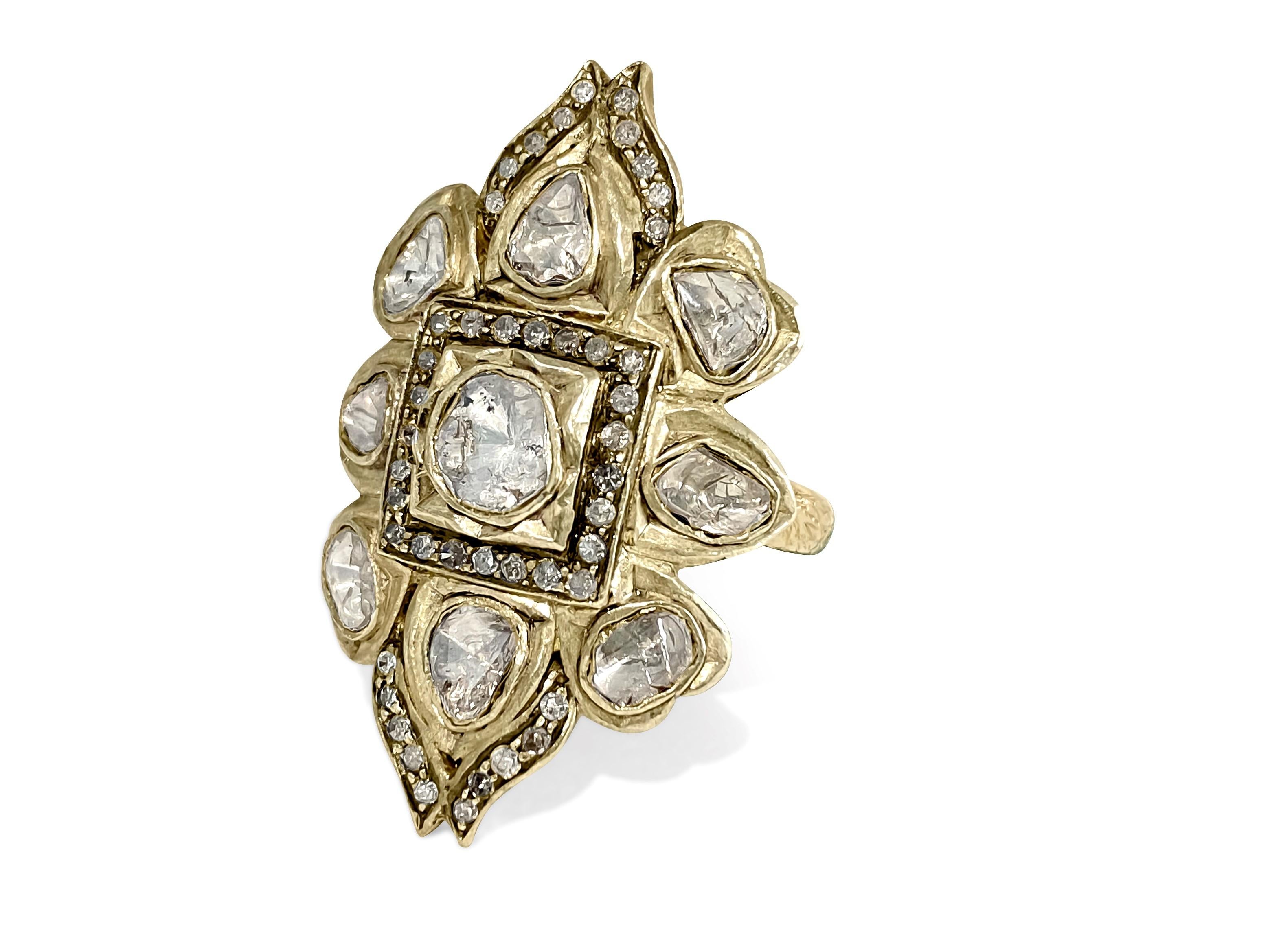 This unique ring features a natural rose-cut diamond pave set in sterling silver and complemented by 14K yellow gold accents. With a gross weight of 10.40 grams, including 4.60 grams of 14K yellow gold and 5.45 grams of 925 sterling silver, it